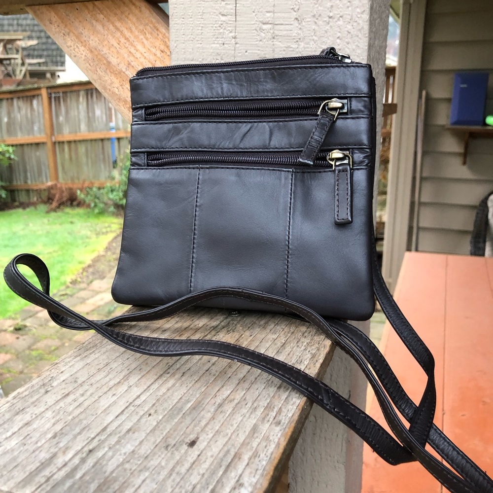Visconti crossbody front zipper slots  brown 6.5” by 7”.